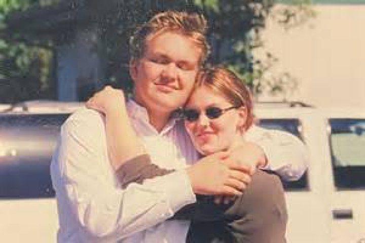 Christopher Candy and his sister Jennifer Candy are holding glasses of wines