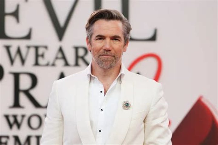 The Australian actor Patrick Brammall (left) with his father Bruce (right), mother Janeece, sister Dane (second from left), and brother Daniel Brammall (backward).