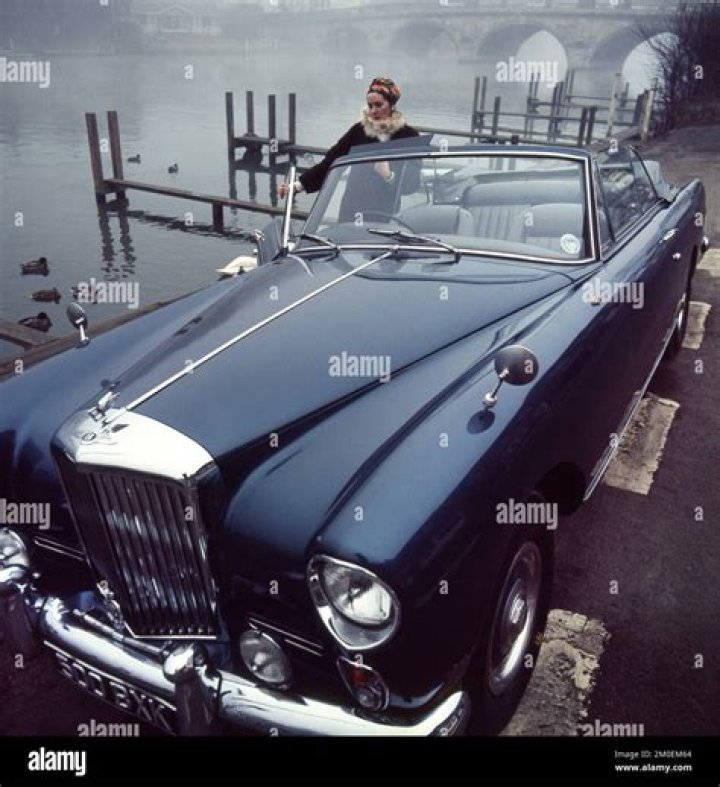 With her Bentley